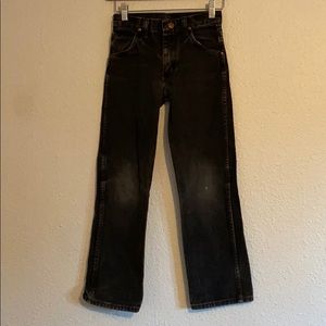 Washed black vintage kids wrangler jeans